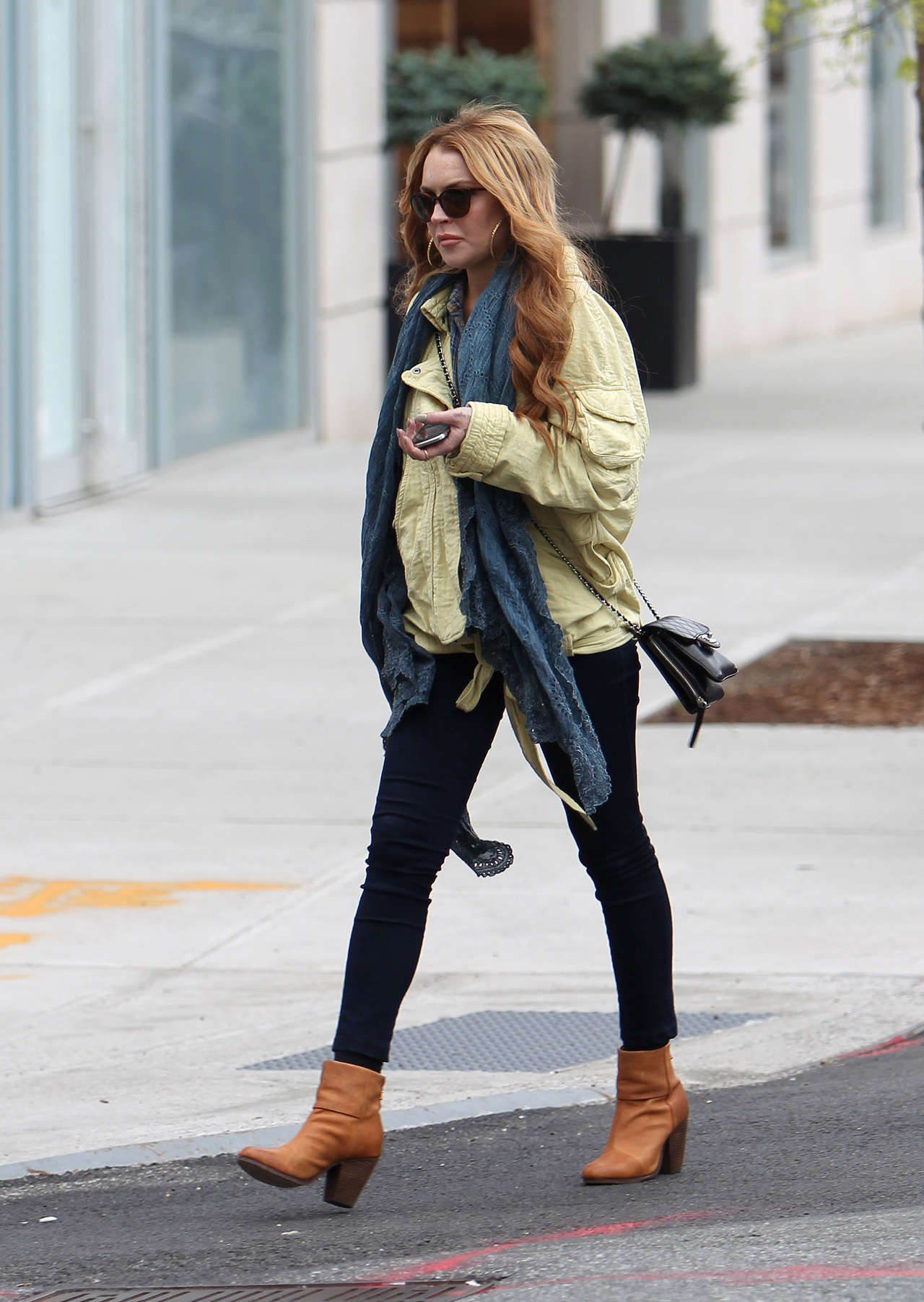 Lindsay Lohan In a Jeans visiting a vintage shop in Brooklyn